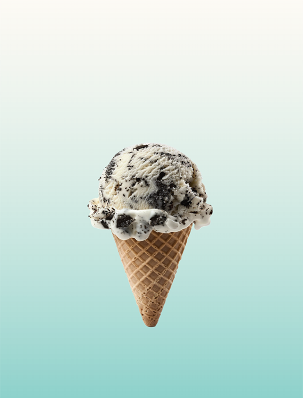 Cookies and cream or Oreo ice cream in a waffle cone with a teal gradient rounded rectangle background