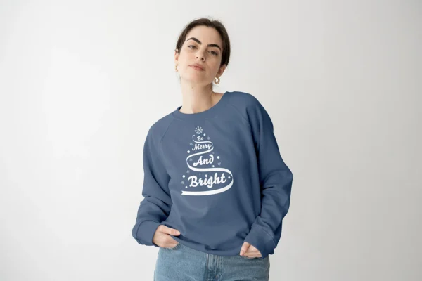 christmas logo design white on a blue sweater being modeled